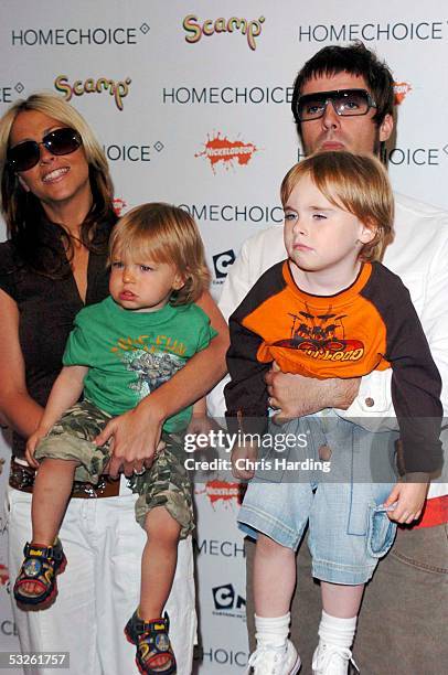 Singer Nicole Appleton, boyfriend, musician Liam Gallagher of Oasis, their son Gene and what may be Appleton's nephew Ace Howlett attend the...