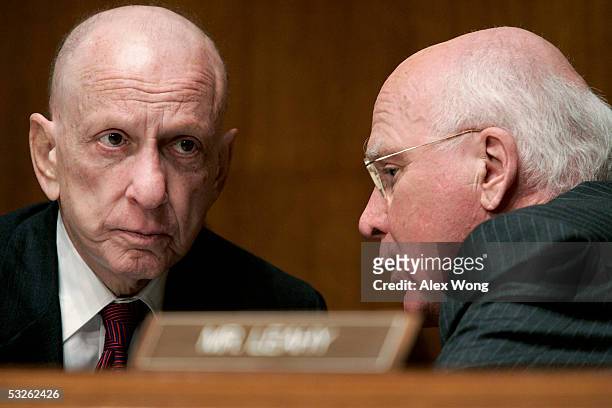 Chairman of the Senate Judicial Committee U.S. Sen. Arlen Specter talks to ranking member U.S. Sen. Patrick Leahy during a hearing on Capitol Hill...