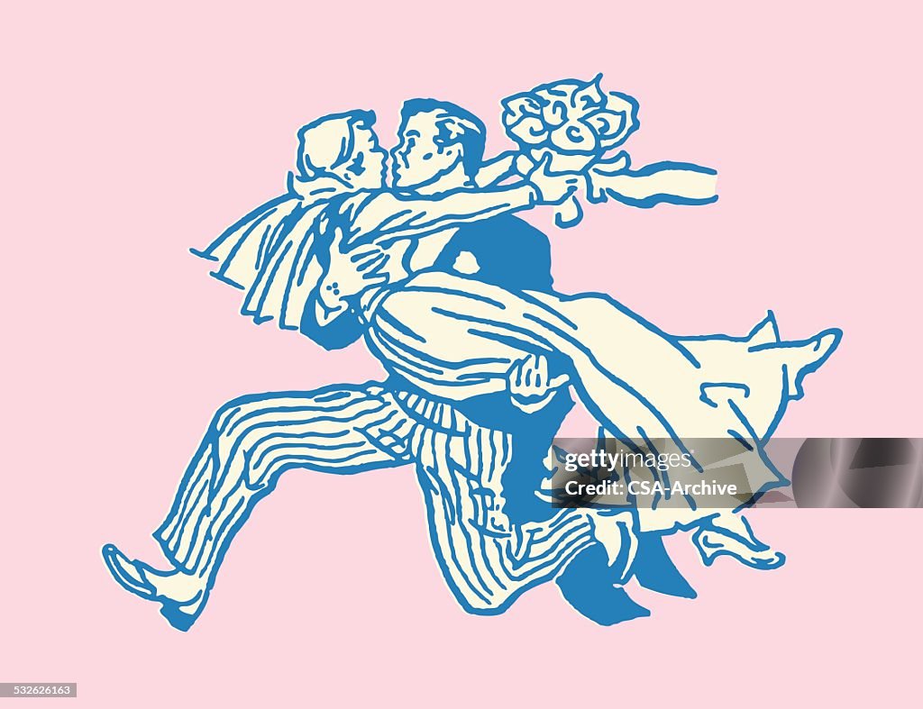 Groom Carrying Bride
