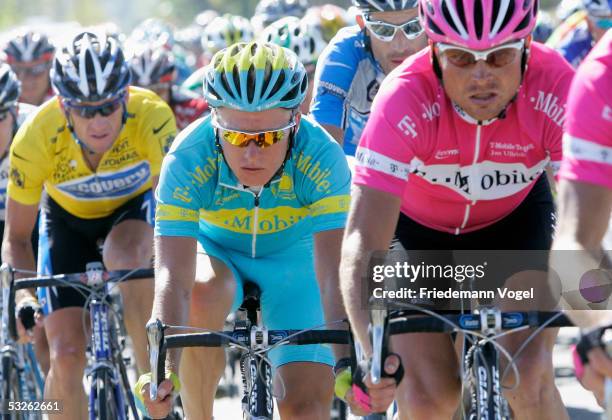 Lance Armstrong of the U.S. And Discovery Channel team, Alexandre Vinokourov of Kazakhstan and T-Mobile and teammate Jan Ullrich of Germany ride...