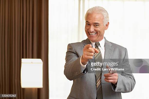 businessman pointing - salesman stockfoto's en -beelden