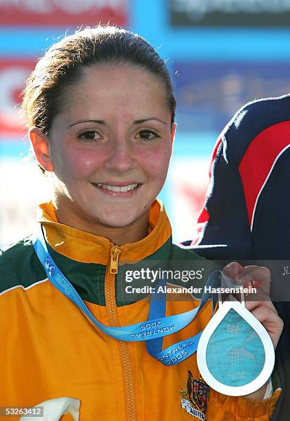 Loudy Tourky of Australia smiles for the camera after winning the silver medal in the Women's 10 meter Platform final during the XI FINA World...