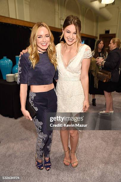 Caity Lotz and Melissa Benoist backstage before The CW Network's 2016 Upfront at New York City Center on May 19, 2016 in New York City.