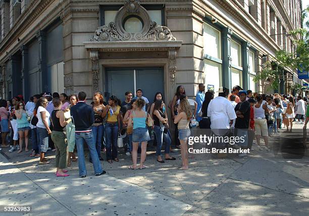 Partygoers stand in line before doors open at the Shawn "Jay - Z" Carter Hosts Teen People Listening Lounge at the Canal Room July 20, 2005 in New...