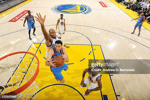 Nick Collison of the Oklahoma City Thunder shoots the ball against the Golden State Warriors in Game Two of the Western Conference Finals during the...