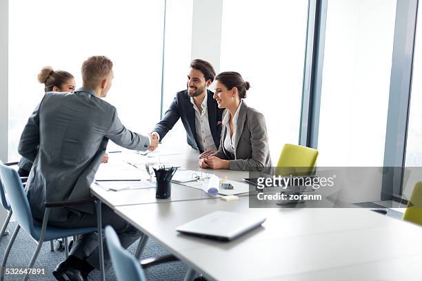 greeting an advisor - colleague stock pictures, royalty-free photos & images