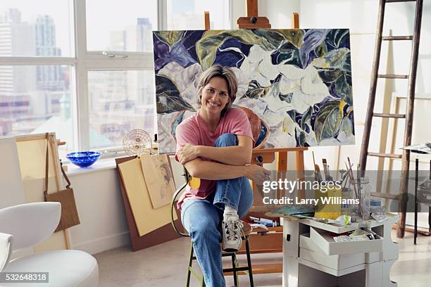 artist in her loft - art room stock pictures, royalty-free photos & images