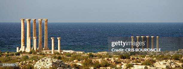 Columns stand roofless against the Mediterranean Sea part of the ruins of the Roman citadel of Sabratha, 67 kilometers west of Tripoli next to the...