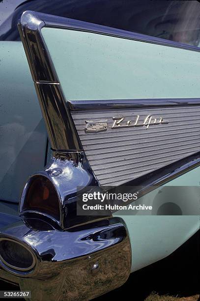 Close-up view of the right-hand tail fin of a 1957 Chevrolet Bel Air car, late 20th century.