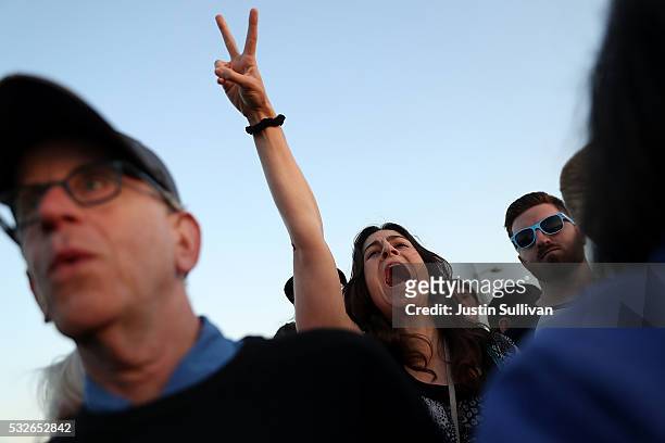 Supporters cheer as Democratic presidential candidate Sen. Bernie Sanders speaks at a campaign rally at Waterfront Park on May 18, 2016 in Vallejo,...