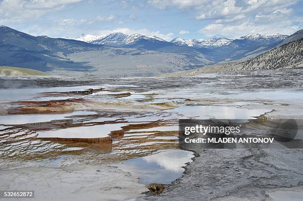 View of the Mammoth Hot Springs at Yellowstone National Park on May 12, 2016. Yellowstone, the first National Park in the US and widely held to be...