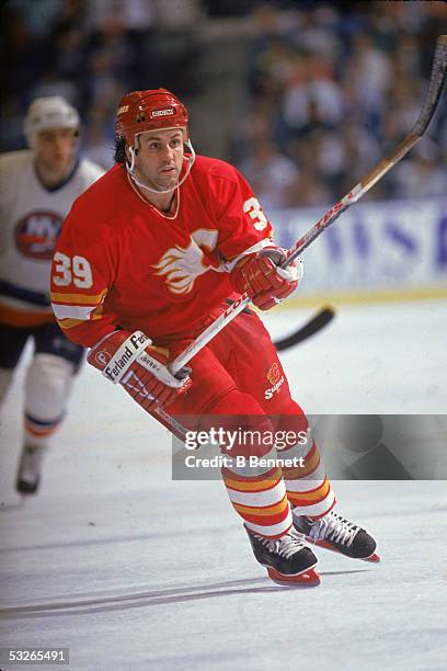 Canadian hockey player Doug Gilmour of the Calgary Flames on the ice during a game against the New York Islanders, November 1990.