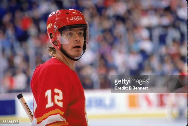 Swedish hockey player Hakon Loob of the Calgary Flames on the ice during a game, 1980s.