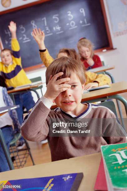 schoolboy lacking answer to question - wrong answer stock pictures, royalty-free photos & images