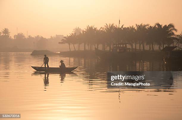 people on the boat in early morning in hoian, vietnam - da nang stock pictures, royalty-free photos & images