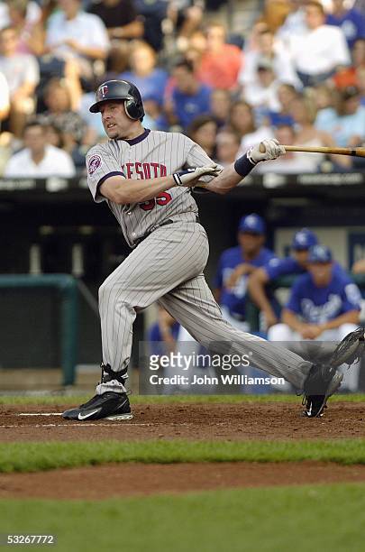 Catcher Mike Redmond of the Minnesota Twins bats during the game against the Kansas City Royals at Kauffman Stadium on July 9, 2005 in Kansas City,...