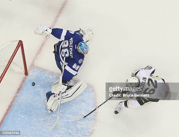 Carl Hagelin of the Pittsburgh Penguins scores on Andrei Vasilevskiy of the Tampa Bay Lightning in Game Three of the Eastern Conference Final during...