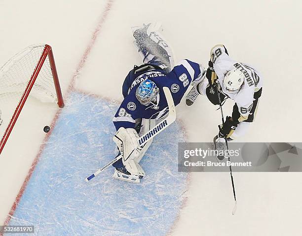 Carl Hagelin of the Pittsburgh Penguins scores on Andrei Vasilevskiy of the Tampa Bay Lightning in Game Three of the Eastern Conference Final during...