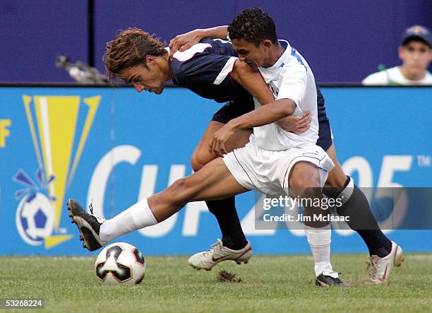 Josh Wolff of the United States battles Mario Berrios of Honduras for the ball during the CONCACAF Gold Cup semifinal match on July 21, 2005 at...
