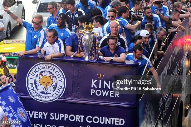 Leicester City's manager Claudio Ranieri, Chairman Vichai Srivaddhanaprabha, Vice Chairman Aiyawatt Srivaddhanaprabha and team players greet locals...