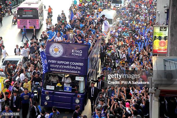 Leicester City's manager Claudio Ranieri, Chairman Vichai Srivaddhanaprabha, Vice Chairman Aiyawatt Srivaddhanaprabha and team players greet locals...