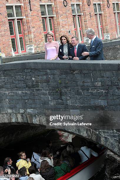 Queen Mathilde of Belgium, Queen Rania of Jordan, King Abdullah II of Jordan and King Philippe - Filip of Belgium pose on Vismarkt bridge during a...