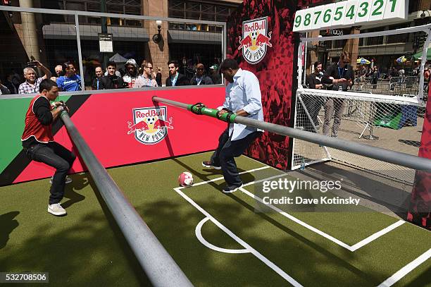 Legend Larry Johnson plays with fans at the MLS Heineken Rivalry Week Human Foosball Soccer event on May 19, 2016 in New York City.