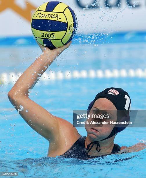 Kelly Rulon of the U.S. Holds the ball during the game against China in the women's water polo preliminary match during the XI FINA World...