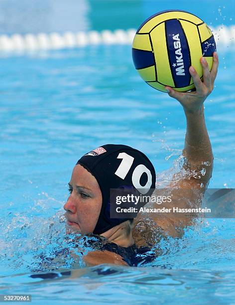 Kelly Rulon of the U.S. Holds the ball during the game against China in the women's water polo preliminary match during the XI FINA World...