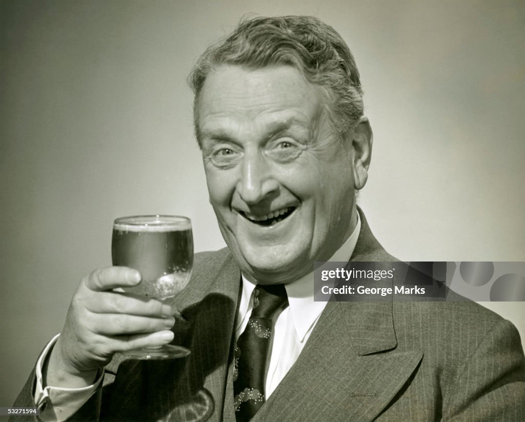 Man having a mixed drink