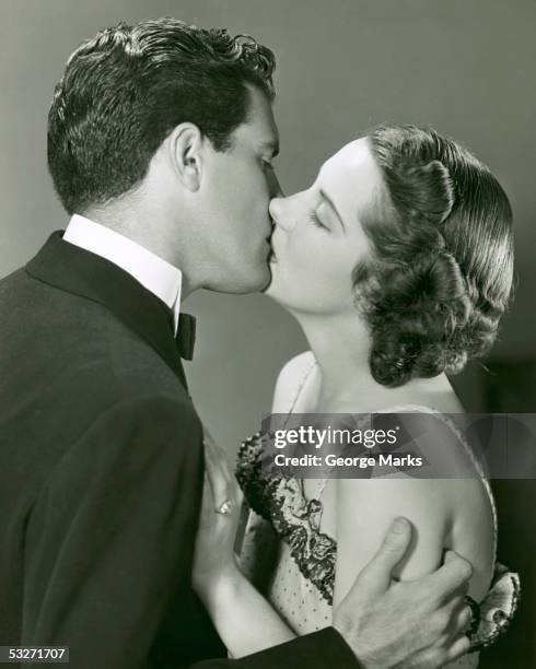 couple kissing - 1950s couple stock pictures, royalty-free photos & images