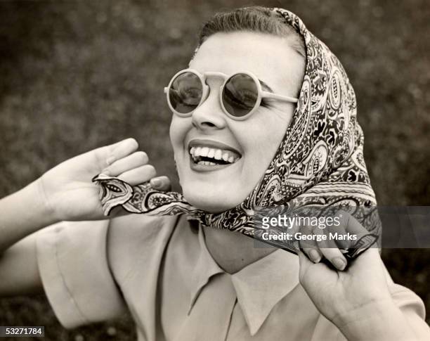 portrait of woman in outerwear and sunglasses - man made age stock pictures, royalty-free photos & images