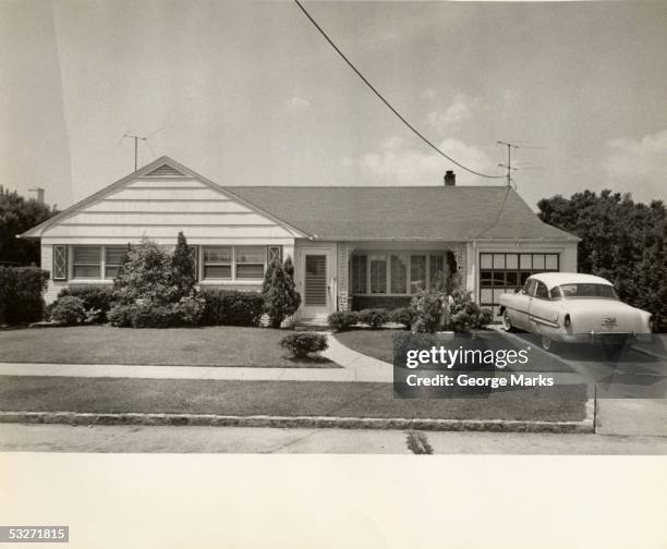 suburban tract house with vintage car in drive - 1950 stock pictures, royalty-free photos & images