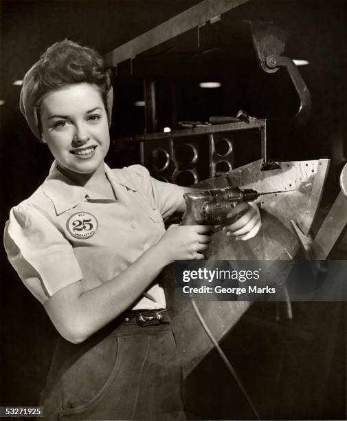 woman working on aircraft assembly line - the home front stock pictures, royalty-free photos & images