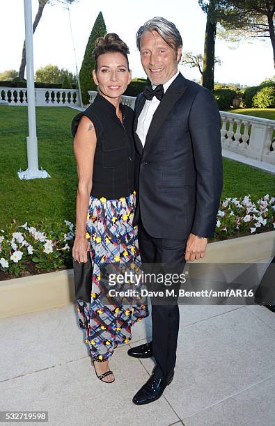 Hanne Jacobsen and Mads Mikkelsen attend amfAR's 23rd Cinema Against AIDS Gala at Hotel du Cap-Eden-Roc on May 19, 2016 in Cap d'Antibes, France.