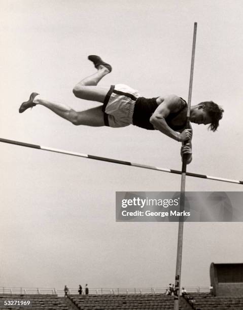 man pole-vaulting - track and field vintage stock pictures, royalty-free photos & images