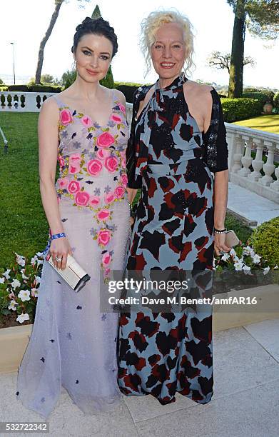 Emma Miller and Ellen von Unwerth attend amfAR's 23rd Cinema Against AIDS Gala at Hotel du Cap-Eden-Roc on May 19, 2016 in Cap d'Antibes, France.