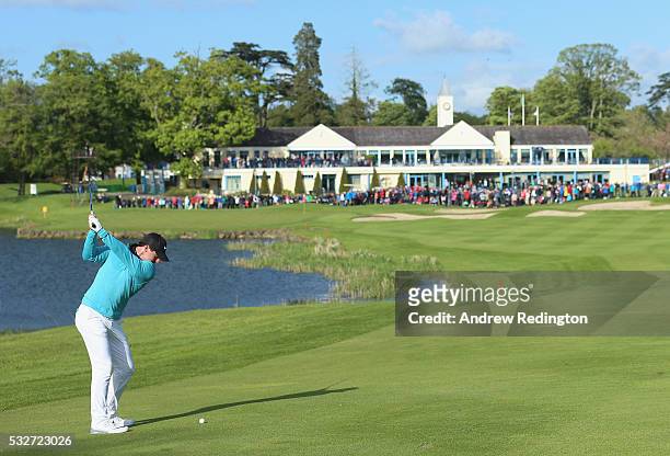 Rory McIlroy of Northern Ireland plays his second shot on the 18th hole during the first round of the Dubai Duty Free Irish Open Hosted by the Rory...