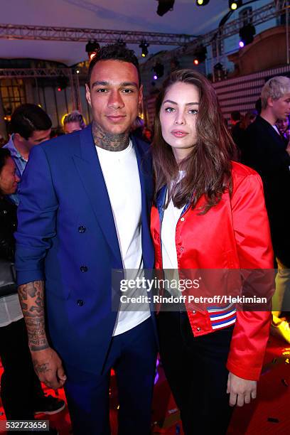 Football player Gregory van der Wiel and Model Marie-Ange Casta attend Tommy Hilfiger Hosts Tommy X Nadal Party - Cocktail on May 18, 2016 in Paris, .