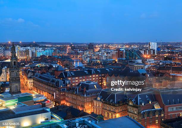 leeds city centre skyline at night - high street stock pictures, royalty-free photos & images