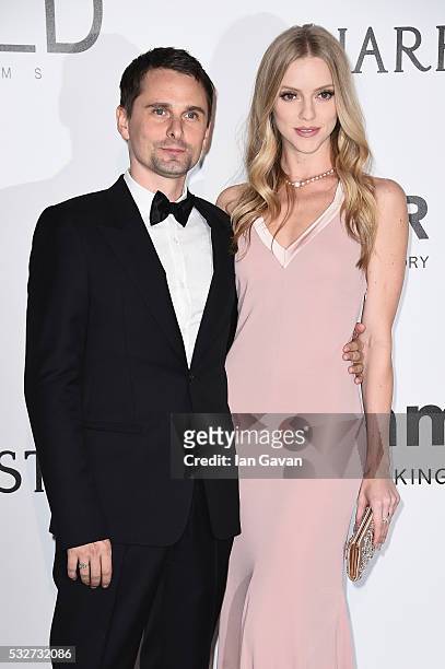 Matthew Bellamy and Elle Evans arrive at amfAR's 23rd Cinema Against AIDS Gala at Hotel du Cap-Eden-Roc on May 19, 2016 in Cap d'Antibes, France.