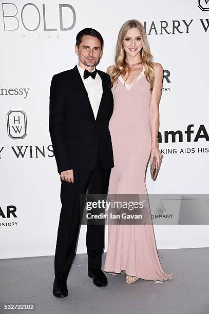 Matthew Bellamy and Elle Evans arrive at amfAR's 23rd Cinema Against AIDS Gala at Hotel du Cap-Eden-Roc on May 19, 2016 in Cap d'Antibes, France.