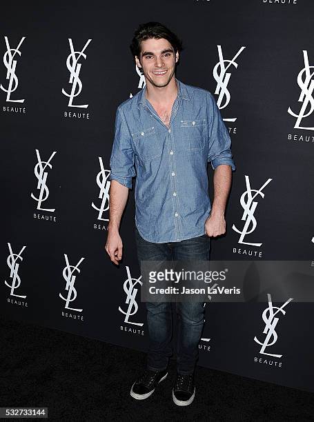 Actor RJ Mitte attends the Yves Saint Laurent Beauty event at Gibson Brands Sunset on May 18, 2016 in Los Angeles, California.