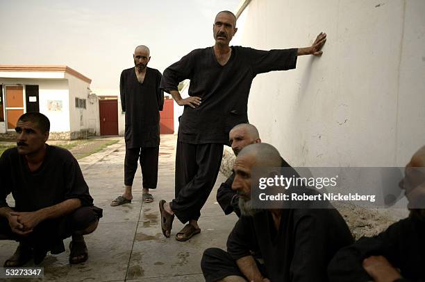 At the Nejat Center for Drug Rehabilitation in Kabul, Afghanistan July 11 heroin and opium drug addicts talk about their morning physical exercises....