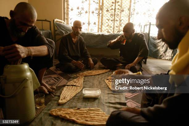 At the Nejat Center for Drug Rehabilitation in Kabul, Afghanistan July 11 heroin and opium drug addicts in their first week of rehab share a...