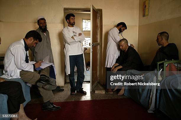 At the Nejat Center for Drug Rehabilitation in Kabul, Afghanistan July 11 heroin and opium drug addicts are given vitamins and medicine during a...