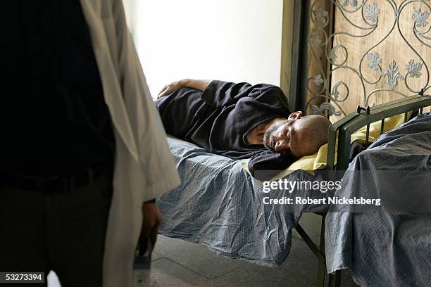 At the Nejat Center for Drug Rehabilitation in Kabul, Afghanistan July 11 heroin and opium drug addicts are given vitamins and medicine during a...