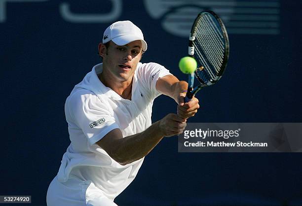 Andy Roddick returns a shot to Robby Ginepri during the RCA Championships July 22, 2005 at Indianapolis Tennis Center in Indianapolis, Indiana....