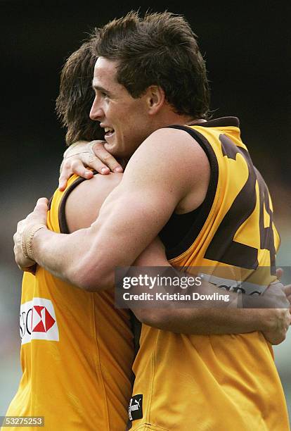 Trent Croad for the Hawks celebrates a goal during the round seventeen AFL match between the Hawthorn Hawks and Carlton Blues at the MCG on July 23,...