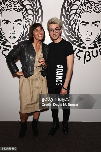 Artistic Director & Head Designer Lucas Cruz Bueno and writer Sara Darling pose during Cruz Bueno Fashion Show Season 2016 on May 19, 2016 in London,...